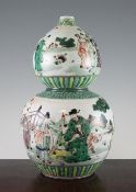 A Chinese famille verte double gourd vase, painted with immortals and attendants in a garden,