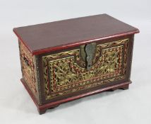 An Indonesian polychrome and carved giltwood chest, Madura, 20th century, the front and side panels