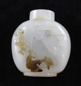 A Chinese agate snuff bottle, of flattened globular form, carved in high relief to a brown