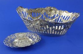 A late 19th/early 20th century German 800 standard pierced silver oval bowl, decorated with swags