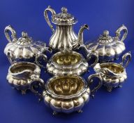 A William IV four piece silver tea and coffee set and a matching three piece tea set, of melon
