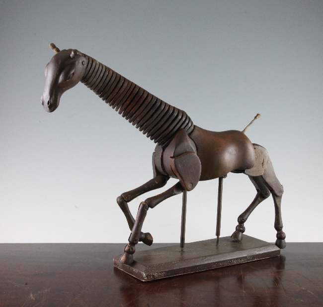 An unusual artist`s lay model of a giraffe, on rectangular base, 16.5in.