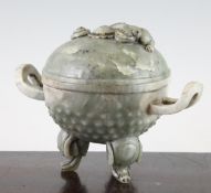 A Chinese green bowenite censer and cover, in archaistic style, the domed cover carved in relief