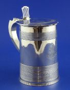 A George III silver tankard, of cylindrical form with pierced thumbpiece and reeded banding,