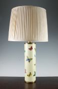 A Fornasetti cylindrical table lamp, with coloured lithograph butterflies and brass mounts,