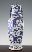 A Chinese blue and white hexagonal baluster `dragon` vase, Kangxi mark, late 19th century, with