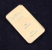 A Baird & Co 999.9 fine gold ingot, 50 grams, approx. 1.75in.