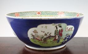 A large Chinese famille rose blue ground bowl, late 19th century, the interior painted in iron red