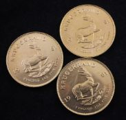 Three 1981 gold Krugerrands.
