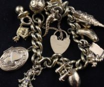 A 9ct gold curb link charm bracelet, hung with fourteen assorted charms, gross 96 grams.