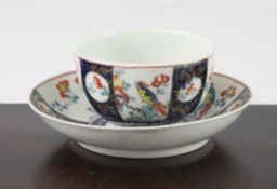 A Worcester polychrome `Sir Joshua Reynolds` pattern cup and saucer, c.1770, decorated with