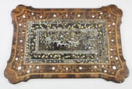 A Japanese rectangular Namban lacquer panel, c.1600, now set into an 18th century Dutch marquetry