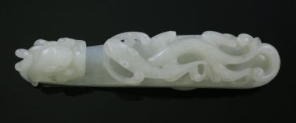 A Chinese white jade `dragon` belt hook, 18th / 19th century, carved with an open work chi-dragon to