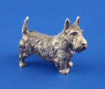 A 1970`s silver free standing miniature model of a Yorkshire terrier, with textured fur, BSE