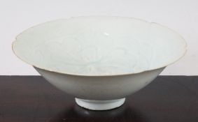 A Chinese Yingqing bowl, Song / Jin dynasty, the interior incised with flowers and foliage, with a