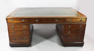 A Victorian mahogany partner`s desk, with greek key gilt tooled writing surface above six frieze