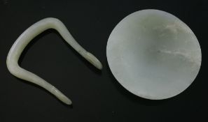 A Chinese celadon jade snuff dish and a similar handle or ornament, 19th century, the snuff dish
