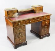 An Edwards & Roberts Edwardian marquetry inlaid mahogany pedestal desk, the top with galleried