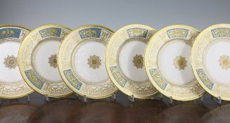 Eighteen Minton enamelled and gilt dessert plates, 20th century, each centre with turquoise and
