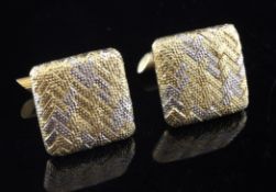 A pair of 18ct two colour gold cufflinks, of square form, with textured chevron decoration, 12.3