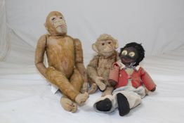 An early 20th century Steiff monkey, mohair worn and ear button missing, 19in, together with another