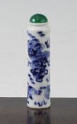A Chinese blue and white tall cylindrical snuff bottle, 1830-1900, painted with Buddhist lions, a