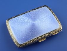 A 1920`s silver and blue guilloche enamel cigarette case, of rounded rectangular form, with black