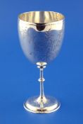 A Victorian silver goblet, with engraved foliate decoration, on turned knopped stem, Frederick