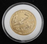 A US 1999 Gold Eagle 50 dollar proof coin.