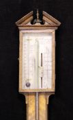 A George III mahogany stick barometer, with silvered scale, signed F. Benalaqua & Co Fecit,