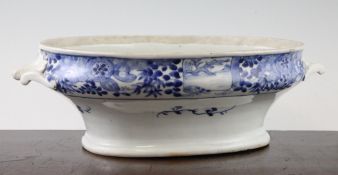 A rare Chinese export blue and white tureen base, early 18th century, of oval form with a pair of