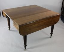 A 19th century mahogany extending dining table, the drop leaf top extending with concertina action