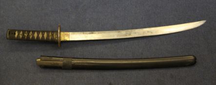 A late 19th / early 20th century Japanese wakizashi sword, with ray skin handle, gilt metal