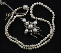 A single strand graduated natural pearl necklace, with diamond set gold clasp, with Gem & Pearl