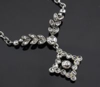 A 19th century silver and diamond pendant necklace, with star shaped drop and set with old and