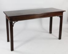 A George III mahogany rectangular serving table, with fret pierced corner brackets, on chamfered