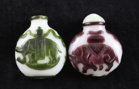 Two Chinese single colour overlay glass `elephant` snuff bottles, 19th / 20th century, in purple and