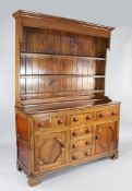 A 19th century mahogany and oak Conwy Valley dresser, with bun handles and ivory escutcheons, W.