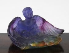 A Daum pate-de-verre figural glass dish, modelled as a winged man, predominantly in purple,