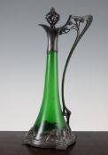 A WMF Art Nouveau pewter and green glass ewer, with pierced stopper and whiplash handles, the base