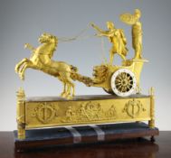 A French Empire ormolu mantel clock, c.1810, modelled as a Roman chariot, with driver and figure