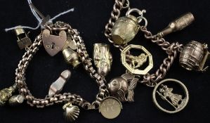 Two 9ct gold charm bracelets, both hung with assorted charms, gross 58 grams.