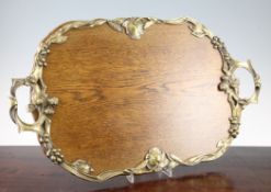 A French Art Nouveau silvered brass mounted oak tray, 24.5in.