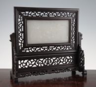 A Chinese white soapstone and carved wood table screen, the plaque carved in relief with two