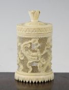 A Chinese ivory pot and cover, early 20th century, carved in relief with two dragons on a piercework