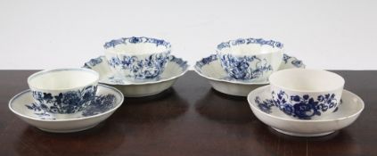 Two Worcester blue and white `Hollow Rock Lily` pattern fluted tea bowls and saucers, c.1770, `W`