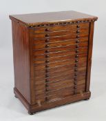 A Victorian mahogany collector`s chest, with cotton reel mouldings, fitted fifteen glass topped