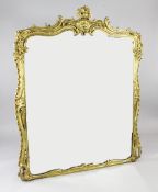 A Victorian gilt overmantel mirror, with acanthus leaf and floral decorated frame, 5ft 1in. x 4ft