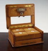 A 19th century satinwood playing card box, decorated with simulated stitching, the top with bevelled