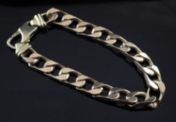 A large 9ct curb link bracelet, 75 grams, 9.5in.